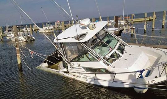 The best defense against a dock side sinking is to check on your vessel often, and ensure that cockpit drains are kept clear of debris.